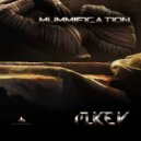 M Key - Cap Mummification